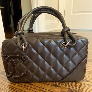 Brown Chanel handbag.